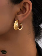 ELLIPTICAL HONEY CURVED  U SHAPED HOOP EARRING