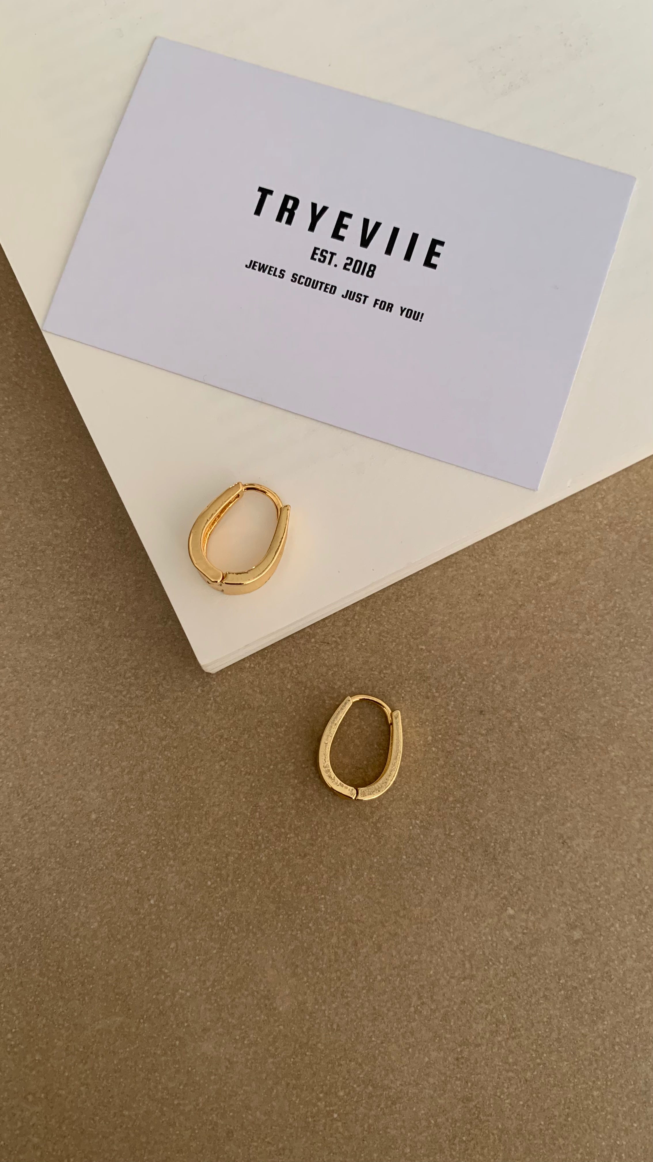 ELLIPTICAL HONEY CURVED  U SHAPED HOOP EARRING